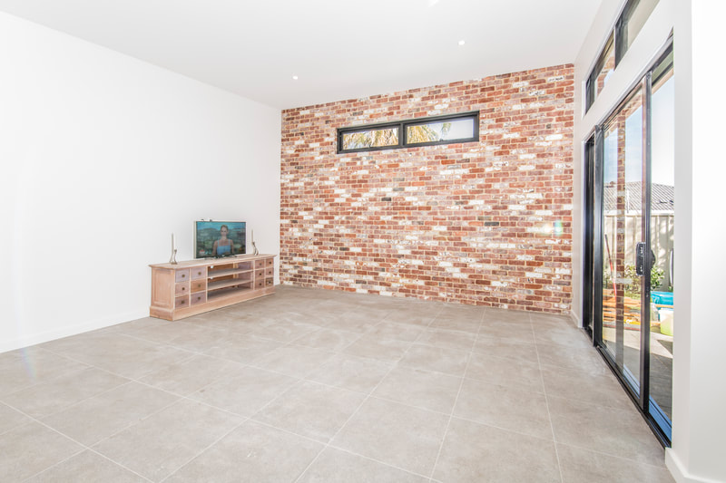 feature brick wall- recycled red brick 