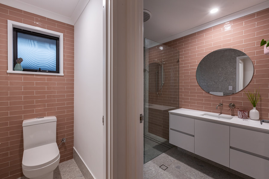Pink bathrooma nd toilet Distinct Renovations Project Perth