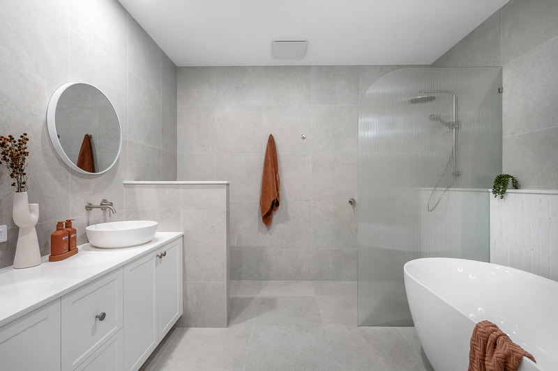 Bathroom curved shower screen free standing bath Mount Hawthorn Distinct Building Company